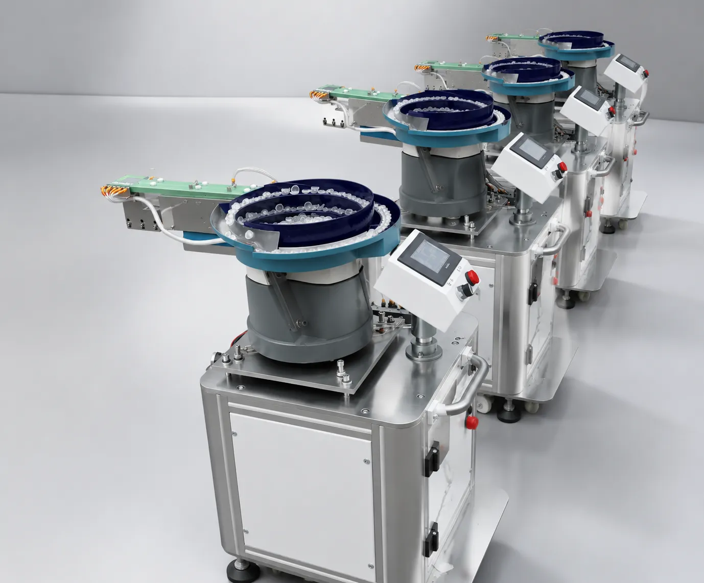 JHIMS lens vibratory bowl feeder feeding LED lenses to a pick-and-place machine